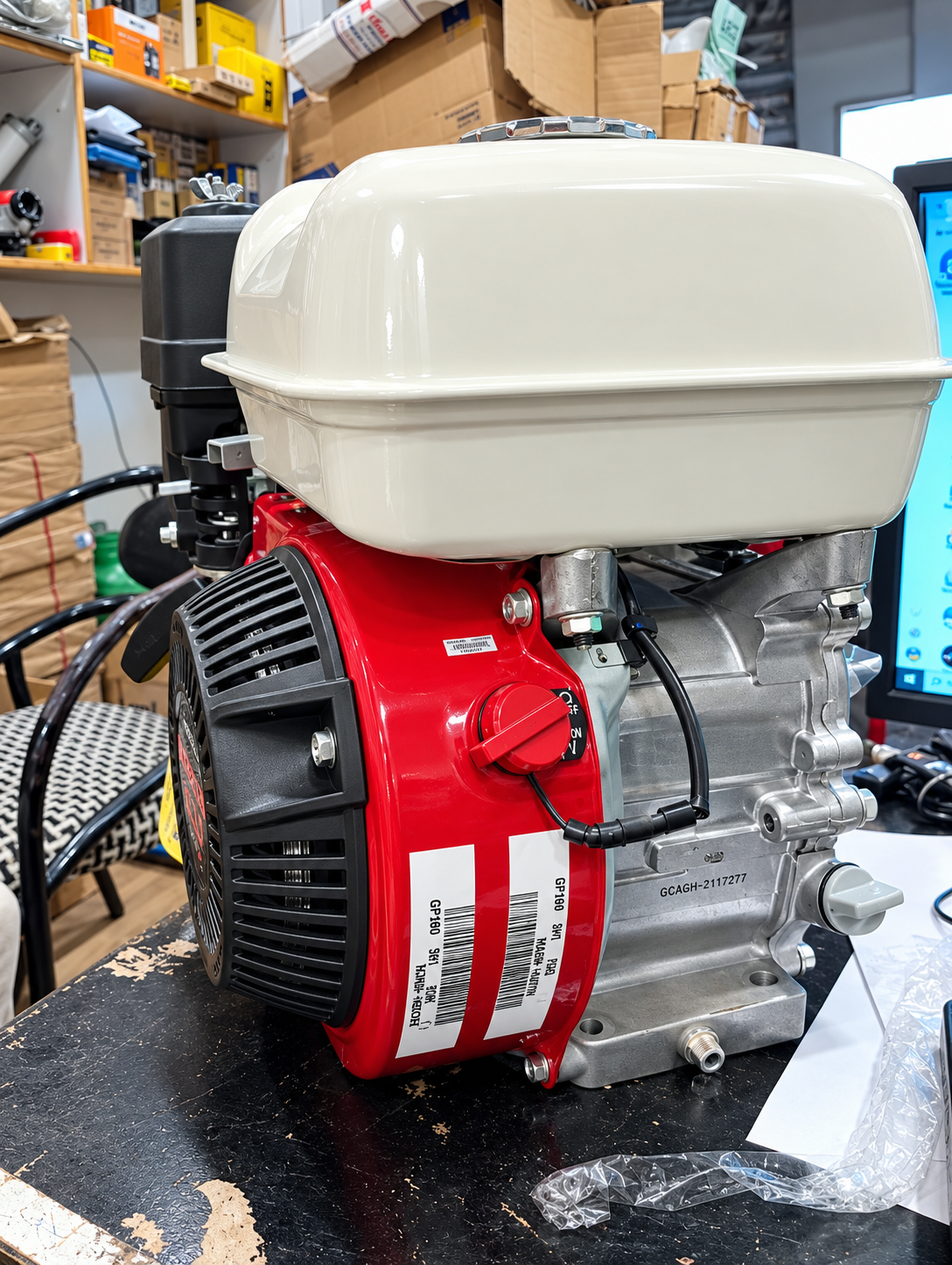 Honda GP160 engine side view and air filter