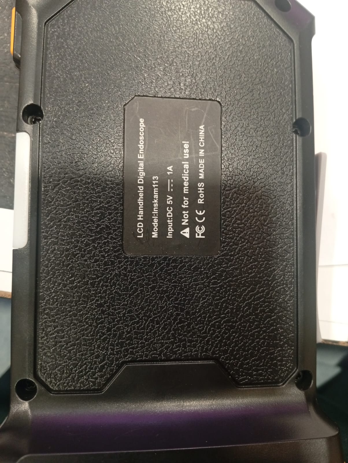 Portable handheld industrial endoscope with flexible inspection cable