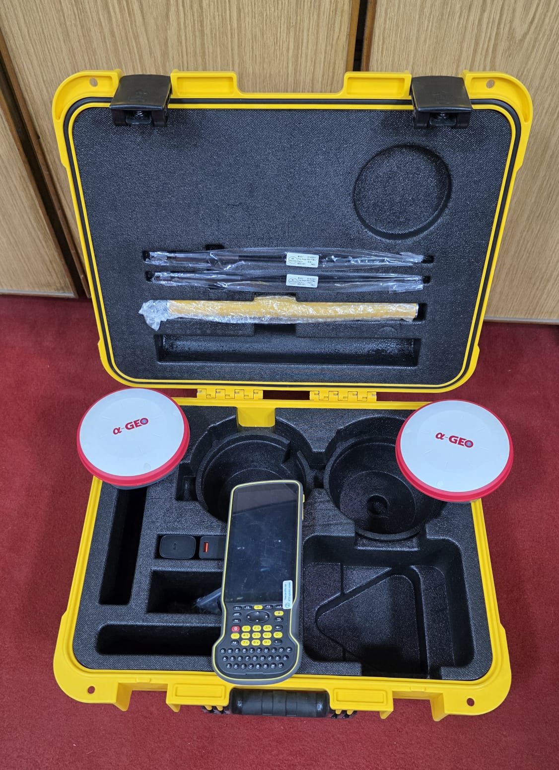 Alpha GEO L100 PRO Rover Base RTK GNSS Set performing RTK land survey