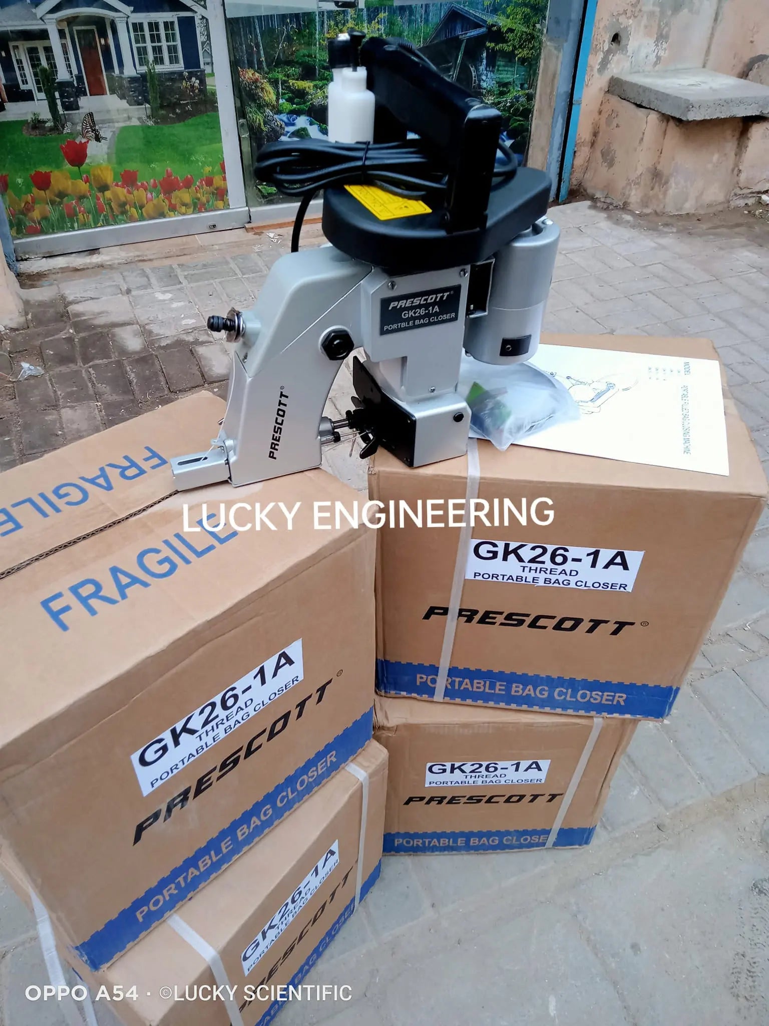 Portable industrial bag stitching machine for closing sacks and bags